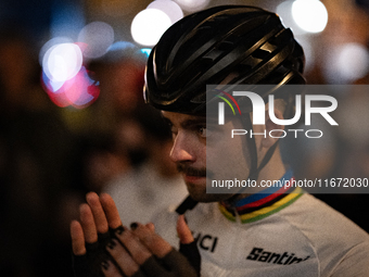 People gather to pay tribute to Paul, 27, a cyclist who is run over by a car in Paris following a dispute, at Place de la Madeleine with the...