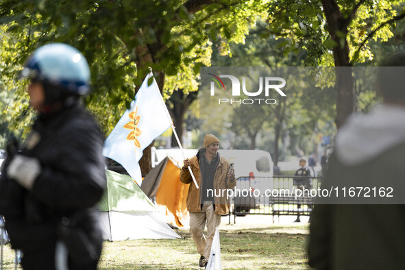 In Washington, DC, on October 14, an Indian tribe from San Francisco rides on horses and makes it to the National Mall, where they have been...