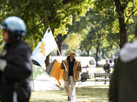 In Washington, DC, on October 14, an Indian tribe from San Francisco rides on horses and makes it to the National Mall, where they have been...