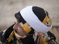 An Iranian nomadic woman smiles while participating in the 11th National Handicrafts and 3rd International Tourism Exhibition in the histori...