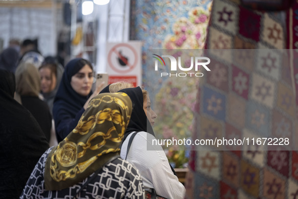 Iranian women visit the 11th National Handicrafts and 3rd International Tourism Exhibition in the historical city of Tabriz, located 624 km...