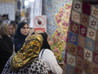 Iranian women visit the 11th National Handicrafts and 3rd International Tourism Exhibition in the historical city of Tabriz, located 624 km...