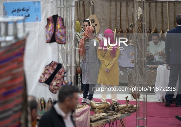 Iranian women visit the 11th National Handicrafts and 3rd International Tourism Exhibition in the historical city of Tabriz, located 624 km...