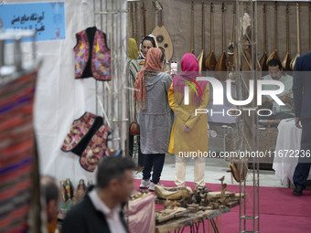 Iranian women visit the 11th National Handicrafts and 3rd International Tourism Exhibition in the historical city of Tabriz, located 624 km...