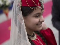 A young Iranian girl wears Turkish traditional dresses while participating in the 11th National Handicrafts and 3rd International Tourism Ex...