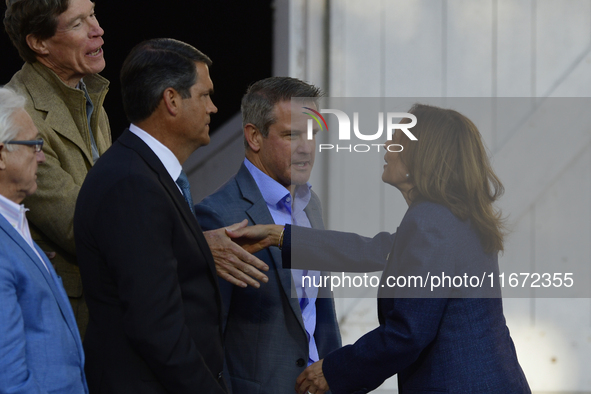 U.S. Vice President Kamala Harris takes the stage with a group of current and former Republicans, including Former United States Representat...