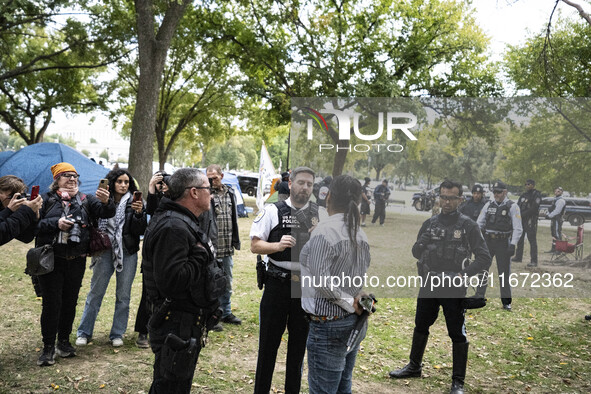 In Washington, DC, on October 14, an Indian tribe from San Francisco rides on horses and makes it to the National Mall, where they have been...