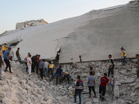 Russian airstrikes on Idlib Province in northwestern Syria, an area under opposition control, resulted in the killing of 10 civilians and th...