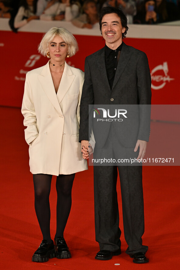 Diodato (R) and a guest attend the ''Berlinguer - The Great Ambition'' (Berlinguer - La grande ambizione) red carpet during the 18th Rome Fi...