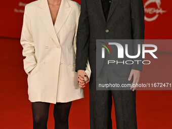 Diodato (R) and a guest attend the ''Berlinguer - The Great Ambition'' (Berlinguer - La grande ambizione) red carpet during the 18th Rome Fi...