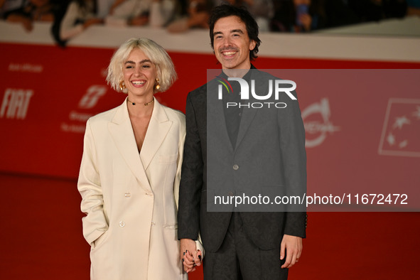 Diodato (R) and a guest attend the ''Berlinguer - The Great Ambition'' (Berlinguer - La grande ambizione) red carpet during the 18th Rome Fi...