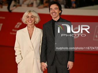 Diodato (R) and a guest attend the ''Berlinguer - The Great Ambition'' (Berlinguer - La grande ambizione) red carpet during the 18th Rome Fi...