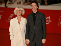 Diodato (R) and a guest attend the ''Berlinguer - The Great Ambition'' (Berlinguer - La grande ambizione) red carpet during the 18th Rome Fi...