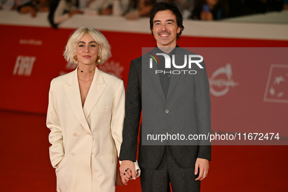 Diodato (R) and a guest attend the ''Berlinguer - The Great Ambition'' (Berlinguer - La grande ambizione) red carpet during the 18th Rome Fi...