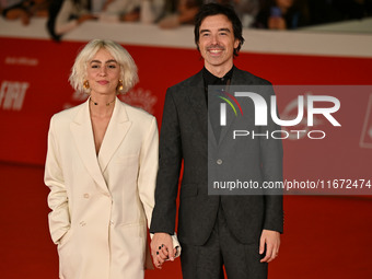 Diodato (R) and a guest attend the ''Berlinguer - The Great Ambition'' (Berlinguer - La grande ambizione) red carpet during the 18th Rome Fi...