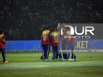 Konark Suryas Odisha players celebrate the dismissal of Shreevats Goswami of Southern Superstars during the finals of the Legends League Cri...