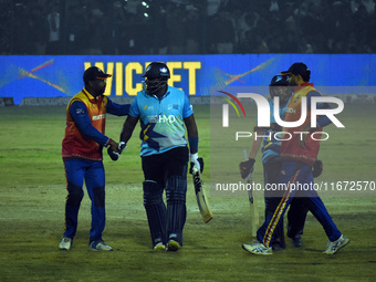 Hamilton Masakadza (c) of Southern Superstars receives greetings after scoring 83 from 58 balls during the finals of the Legends League Cric...