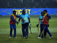 Hamilton Masakadza (c) of Southern Superstars receives greetings after scoring 83 from 58 balls during the finals of the Legends League Cric...