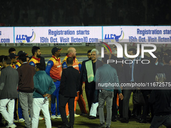 Lieutenant Governor Manoj Sinha (C) arrives to attend the finals of the Legends League Cricket T20 match between Southern Superstars and Kon...