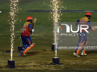 Dilshan Munaweera and Richard Levi walk towards the crease to open the batting for Konark Suryas Odisha during the finals of the Legends Lea...