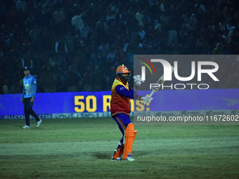 Yusuf Pathan reacts after scoring 50 runs during the finals of the Legends League Cricket T20 match between Southern Superstars and Konark S...