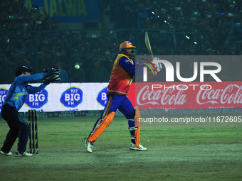 Yusuf Pathan (R) plays a shot during the finals of the Legends League Cricket T20 match between Southern Superstars and Konark Suryas Odisha...