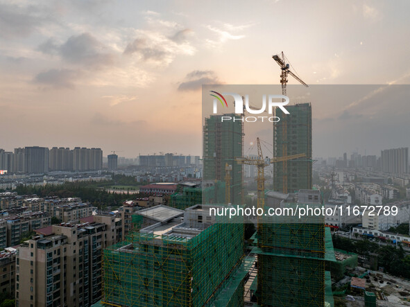 A building is under construction in Qingjiangpu District, Huai'an City, Jiangsu Province, China, on October 16, 2024. 