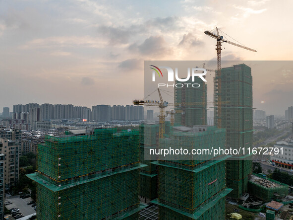 A building is under construction in Qingjiangpu District, Huai'an City, Jiangsu Province, China, on October 16, 2024. 