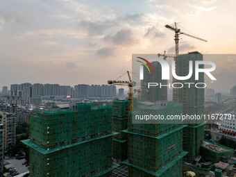 A building is under construction in Qingjiangpu District, Huai'an City, Jiangsu Province, China, on October 16, 2024. (