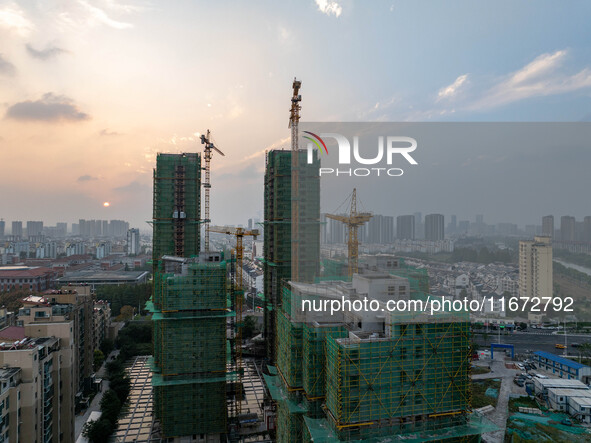 A building is under construction in Qingjiangpu District, Huai'an City, Jiangsu Province, China, on October 16, 2024. 