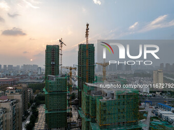 A building is under construction in Qingjiangpu District, Huai'an City, Jiangsu Province, China, on October 16, 2024. (