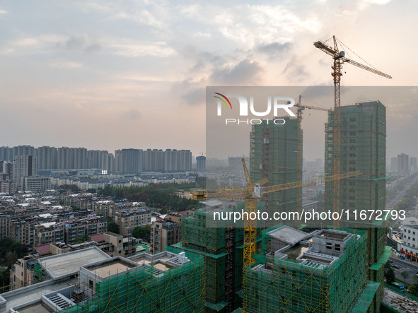 A building is under construction in Qingjiangpu District, Huai'an City, Jiangsu Province, China, on October 16, 2024. 