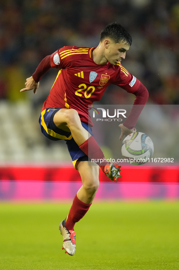 Pedri central midfield of Spain and FC Barcelona controls the ball during the UEFA Nations League 2024/25 League A Group A4 match between Sp...