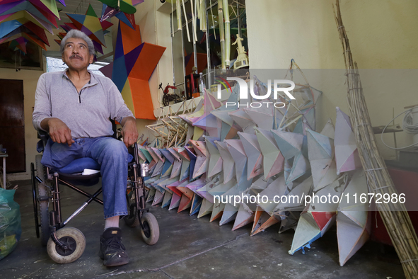 David Galicia, an artisan, prepares to repair, make, and sell the stars of the animas in Mexico City, Mexico, on October 16, 2024, made of r...