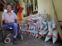 David Galicia, an artisan, prepares to repair, make, and sell the stars of the animas in Mexico City, Mexico, on October 16, 2024, made of r...