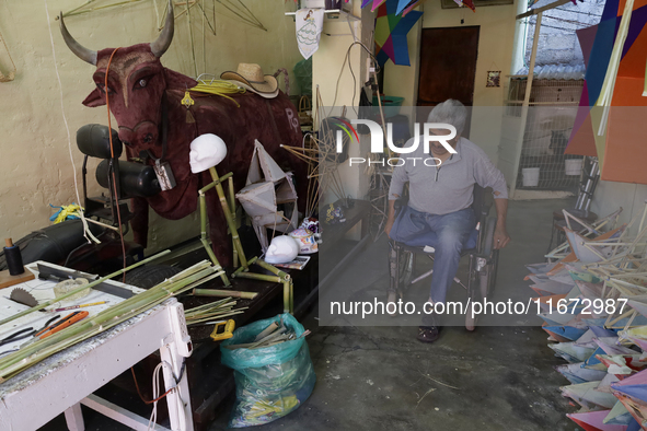 David Galicia, an artisan, prepares to repair, make, and sell the stars of the animas in Mexico City, Mexico, on October 16, 2024, made of r...