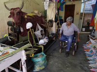 David Galicia, an artisan, prepares to repair, make, and sell the stars of the animas in Mexico City, Mexico, on October 16, 2024, made of r...