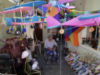 Inside the workshop of David Galicia, an artisan who makes, repairs, and sells animas stars in Mexico City, Mexico, on October 16, 2024. The...