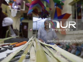 Inside the workshop of David Galicia, an artisan who makes, repairs, and sells animas stars in Mexico City, Mexico, on October 16, 2024. The...