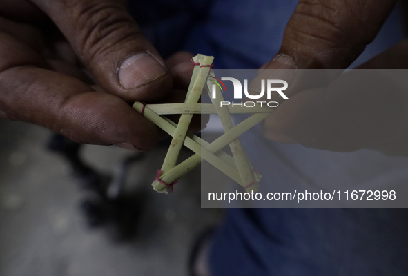 Inside the workshop of David Galicia, an artisan who makes, repairs, and sells animas stars in Mexico City, Mexico, on October 16, 2024. The...