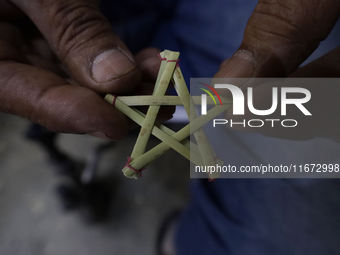 Inside the workshop of David Galicia, an artisan who makes, repairs, and sells animas stars in Mexico City, Mexico, on October 16, 2024. The...