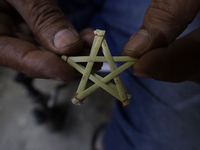 Inside the workshop of David Galicia, an artisan who makes, repairs, and sells animas stars in Mexico City, Mexico, on October 16, 2024. The...