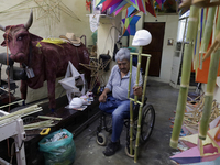 David Galicia, an artisan, repairs dolls and stars of the animas in Mexico City, Mexico, on October 16, 2024, made with this material and co...