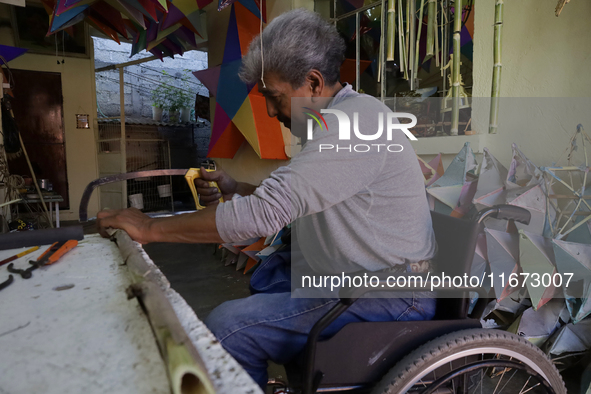 David Galicia, an artisan, cuts reeds for the repair, elaboration, and sale of stars of the animas in Mexico City, Mexico, on October 16, 20...