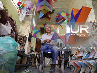 Inside the workshop of David Galicia, an artisan who makes, repairs, and sells animas stars in Mexico City, Mexico, on October 16, 2024. The...