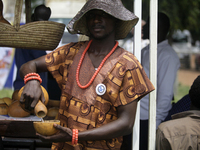 A man pours palm wine as the Lagos State Ministry of Agriculture and Food Systems concludes activities for the 2024 World Food Day, called E...