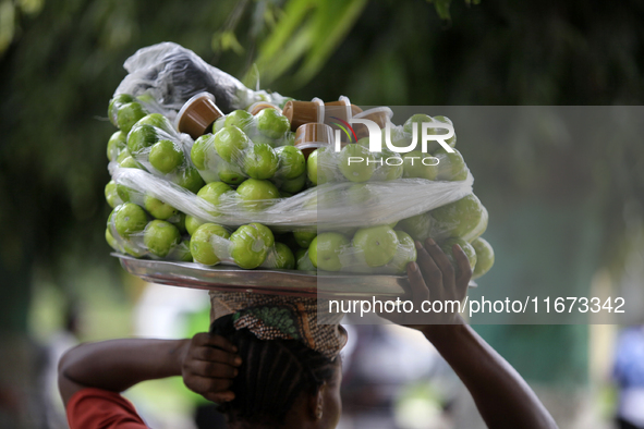 A woman sells garden eggs as the Lagos State Ministry of Agriculture and Food Systems concludes activities for the 2024 World Food Day, call...