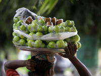 A woman sells garden eggs as the Lagos State Ministry of Agriculture and Food Systems concludes activities for the 2024 World Food Day, call...