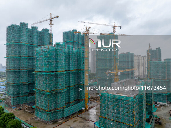 A real estate project is under construction in Qingjiangpu District, Huai'an City, Jiangsu Province, China, on October 17, 2024. 