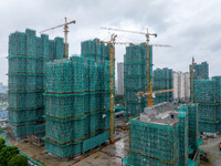 A real estate project is under construction in Qingjiangpu District, Huai'an City, Jiangsu Province, China, on October 17, 2024. (